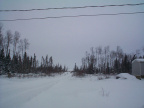 Here we are in the middle of a snow storm. A view of a road going down the lake. That is probably the last loop where the cables