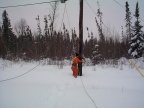 This guy from Blair electronics is getting ready to climb up the hydro pole.