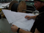 Here one of the guys showing us the blueprint of the installion grid of the cable line.