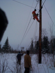 he's got the thing on the other side of the pole.