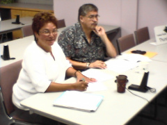 Executive Director of Oshki-Pimache-O-Win Ruth Baxter and Governing Council Chair, Joseph Gagnon sign the agreement from Thunder
