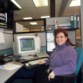 Nathalie - one of the Telecare Registered Nurses at her station, taking calls. She has been with the service for more than 2 yea