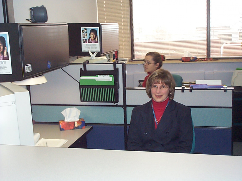 Brenda Omiccioli and co-worker taking care of the front office.