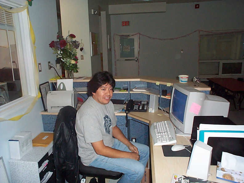 Glen Meekis troubleshooting the reception areas computer