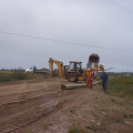 A new hydro pole arrives at the scene.