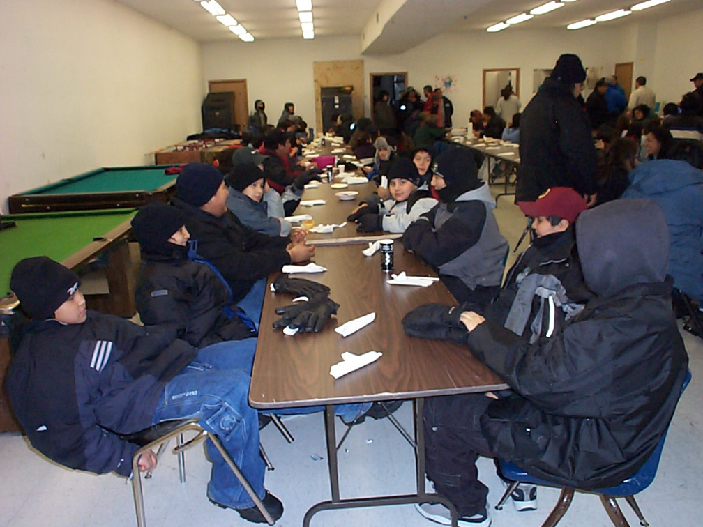 Fort Severn youth waiting for their plates