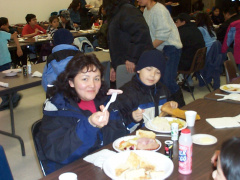 Daisy Kabestra and her family enjoying the feast