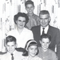 Peggy Sanders and her family- Front row, left to right, Peter, Christine, Kenny. Middle row: Peggy, her husband Don. Back row: J