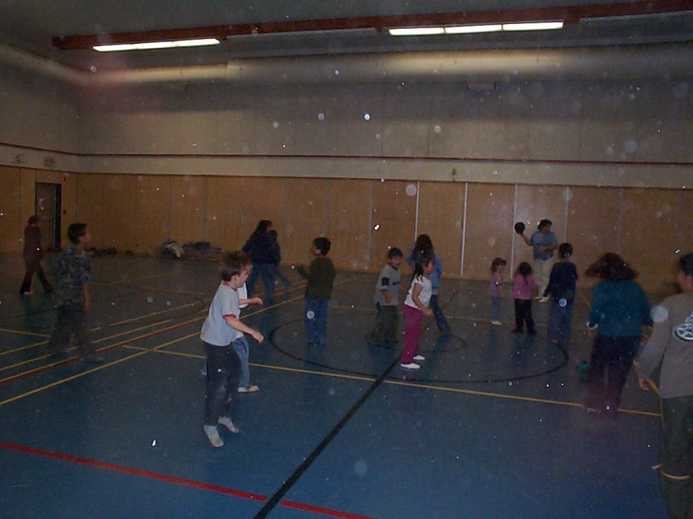 kids playing dodgeball on halloween night.
