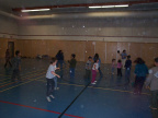 kids playing dodgeball on halloween night.