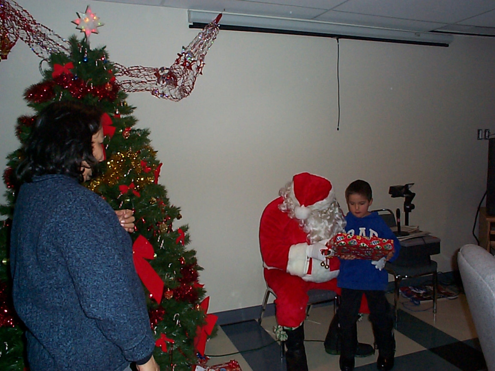 Donald McKenzie getting his turn on Santa's lap!