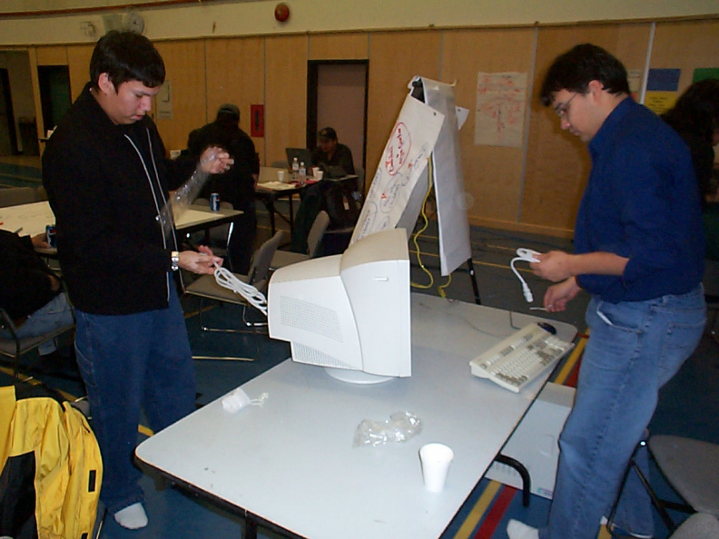 Jesse and Blue setting up the computers to get ready for their demonstration tonight.