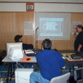 Jesse doing his computer program demonstration. Thats Raymond mason looking on and Blue hiding behind the computer.