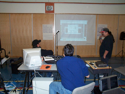 Jesse doing his computer program demonstration. Thats Raymond mason looking on and Blue hiding behind the computer.