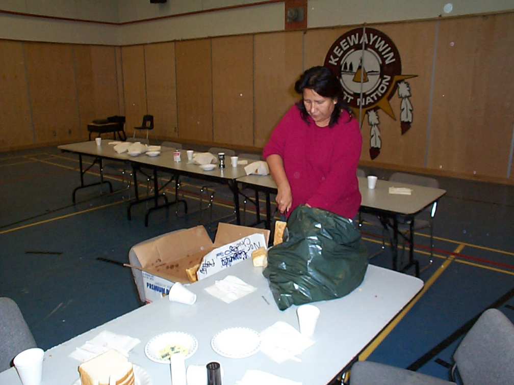 Doreen Kakepetum getting the tables ready for the feast.