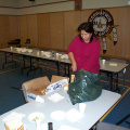 Doreen Kakepetum getting the tables ready for the feast.