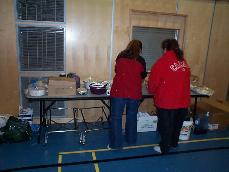 That's Francine Kakepetum and Nancy Kakepetum getting the table ready for the food to arrive.
