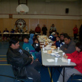 Theres the community members waiting to be served. On the right that is Chimo and in the red Mrs. Chimo.