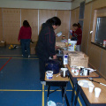 Almost all the food is gone. Thats William Kakegamic looking on, wondering what to take home in a doggy bag.