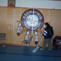 Thats Allison Kakepetum sweeping up the floor by the Keewaywin Logo.