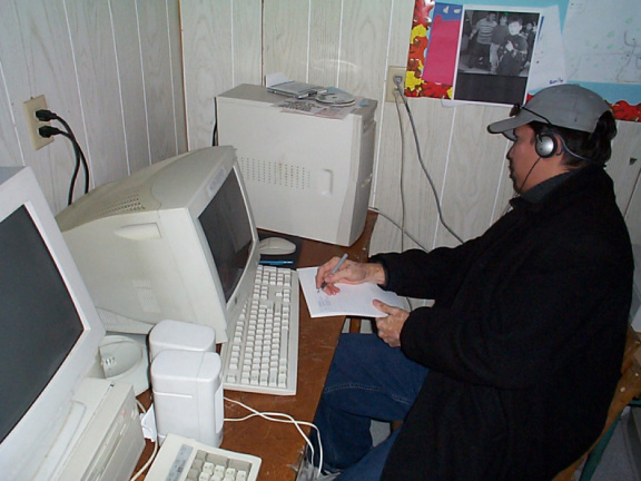 Here Blue writing down serial numbers and the make of the computers.