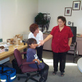 Brenda Pascal, Keewaywin's teacher assistant is there to help with the nurse give flu shots for her students.