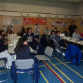 Everyones looking as each staff opens their presents so that they can share what they had received.