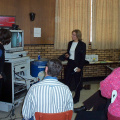 Donna Williams, KO's Telehealth Coordinator, works with Carol Woods, the Menoyawin Telehealth Coordinator to share information w