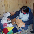 Darlene getting the cable modem ready to be hooked up to the computer