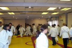 Students are warming up for a self defence workshop
