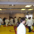 Students are warming up for a self defence workshop