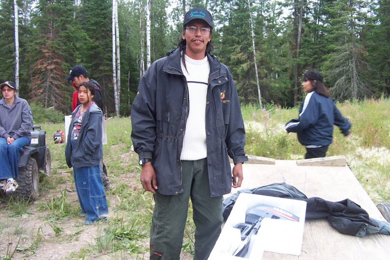 Ian McKay posing with the motor he won. The motor came with a canoe. - acb.jpg acb.jpg