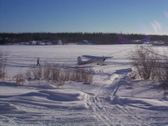 First plane in North Spirit Lake on the ice.