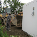2012-06-20-19-moving-NSL-Cable-Headend-Building-into-place-by-band-office
