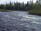 Here comes Tom going solo through these set of rapids