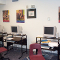 Workstations in at the e-Centre (note the Smart Communities partner plate)