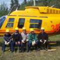 Here we see some of our community members in a photo with the helicopter.