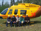 Here we see some of our community members in a photo with the helicopter.
