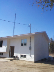 Outside the Saugeen Nation Band Office with the radio phone tower behind