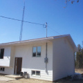 Outside the Saugeen Nation Band Office with the radio phone tower behind