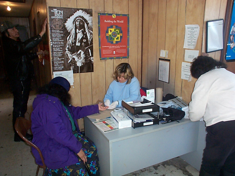 Diabetes check at North Spirit Lake Band Office. Here's the chiefs wife, Maggie Linklater getting her blood checked.