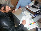 Boyce Meekis (councillor) getting his blood checked too! He's signing his life away as you can see!