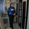 Terry Moreau standing in front of the K-Net rack at Lakehead Universities Braun building.