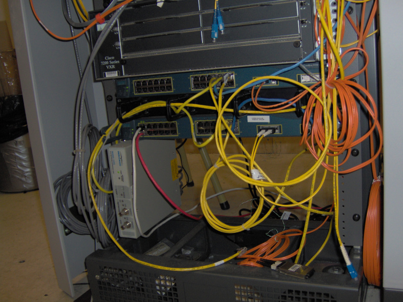 The Crescive switch one floor above the room containing K-Net equipment. A CAT5 cross-connect was installed between this Crescive switch and K-Net equipment to temporarily reach the wireless equipment on the Library roof. IM000397.jpg