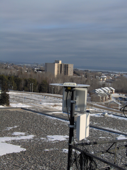 The Aperto equipment on the roof of the Library at Lakehead University. The apartment building in the background is Academy, one