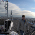 Darryl MacArthur of TBayTel. Crescive and Lakehead University wireless equipment in the background.