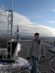 Darryl MacArthur of TBayTel. Crescive and Lakehead University wireless equipment in the background.