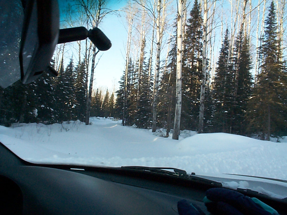 Just off of this road is the cemetary which is on the left. This is us going to Koocheching. We havent' even left the community