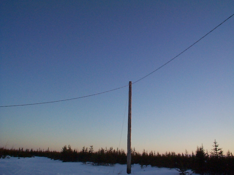 Hydro lines and hydro poles in Koocheching community.