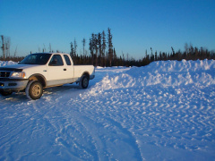 And here is Edwin Meekises truck at the entrance of the airstrip. (the airstrip is only about 1km long.) Air Sandy little plane